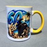Colorful ceramic mug with a tropical beach scene, featuring a black dog and kittens; yellow handle and rim.