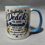 Ceramic mug with blue handle and floral border, featuring Slovenian phrases celebrating grandpa.