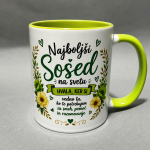 White ceramic mug with a lime-green interior/handle; features Slovenian text 'Najboljši Sosed na svetu' with a green floral border.